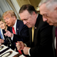 White House Chief Of Staff John Kelly, U.S. Ambassador to NATO Kay Bailey Hutchison, US President Donald Trump, U.S. Secretary Of State Mike Pompeo and U.S. Secretary Of Defense James Mattis attend a breakfast meeting with the NATO Secretary General and staff at the U.S. chief of mission’s residence in Brussels on July 11, 2018, ahead of a NATO (North Atlantic Treaty Organization) summit.